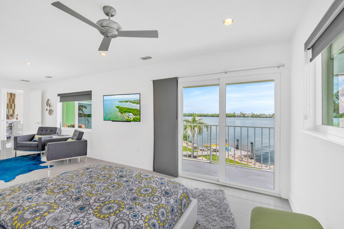 108 Sunset Drive Marathon, FL 33050 - Photo 22 of 46 a living room with furniture and a window