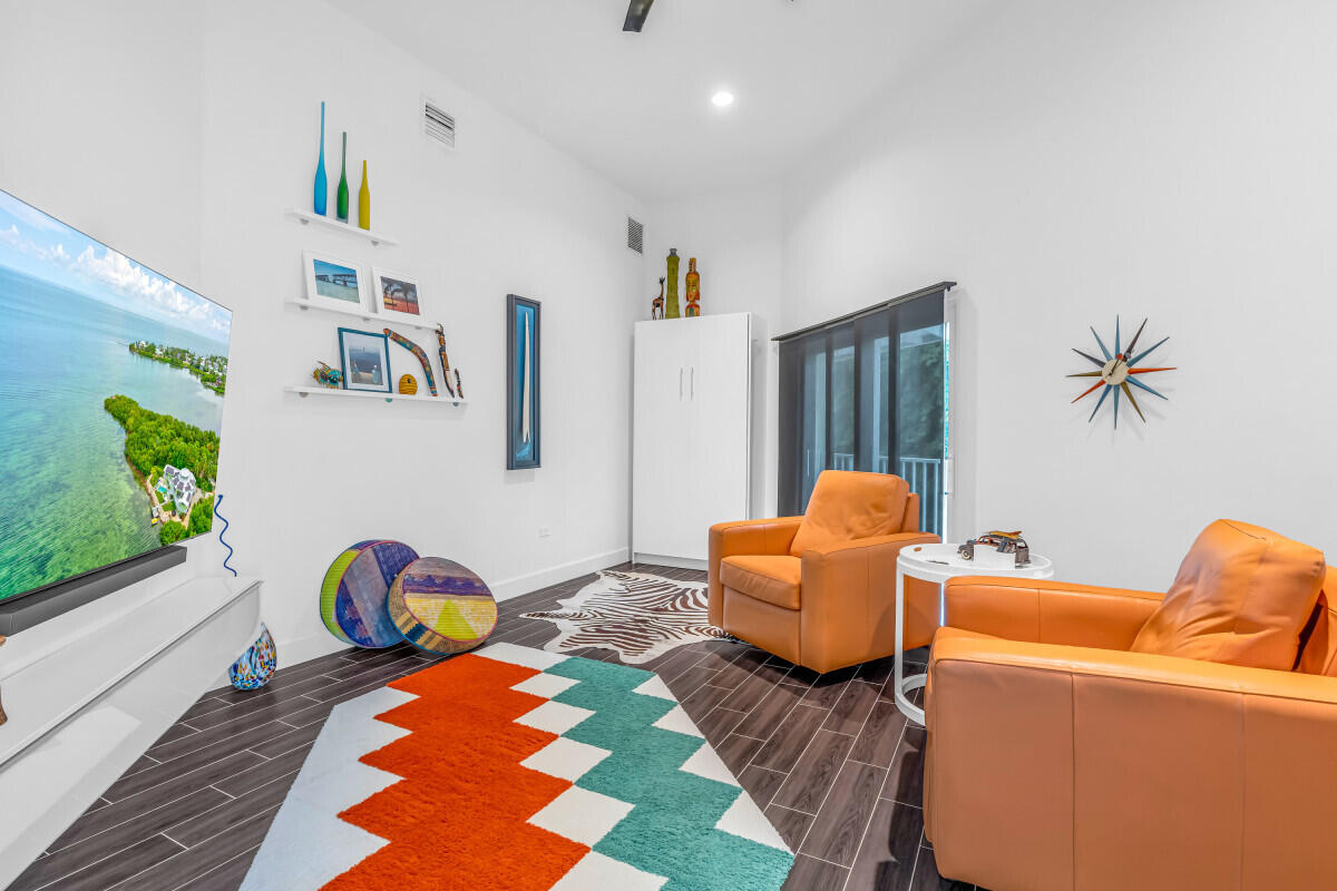 108 Sunset Drive Marathon, FL 33050 - Photo 26 of 46 a view of a livingroom with furniture and a couch
