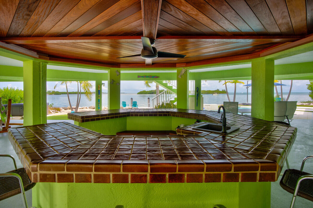 108 Sunset Drive Marathon, FL 33050 - Photo 31 of 46 a view of a swimming pool with a patio