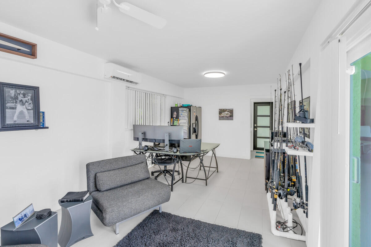 108 Sunset Drive Marathon, FL 33050 - Photo 34 of 46 a living room with furniture and a table