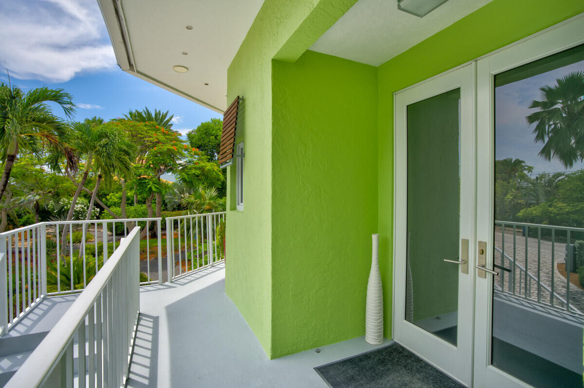 108 Sunset Drive Marathon, FL 33050 - Photo 6 of 46 a view of balcony with small garden