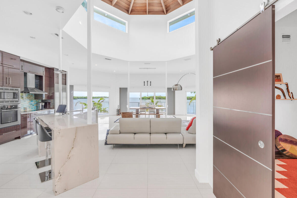 108 Sunset Drive Marathon, FL 33050 - Photo 7 of 46 a living room with furniture and a couch