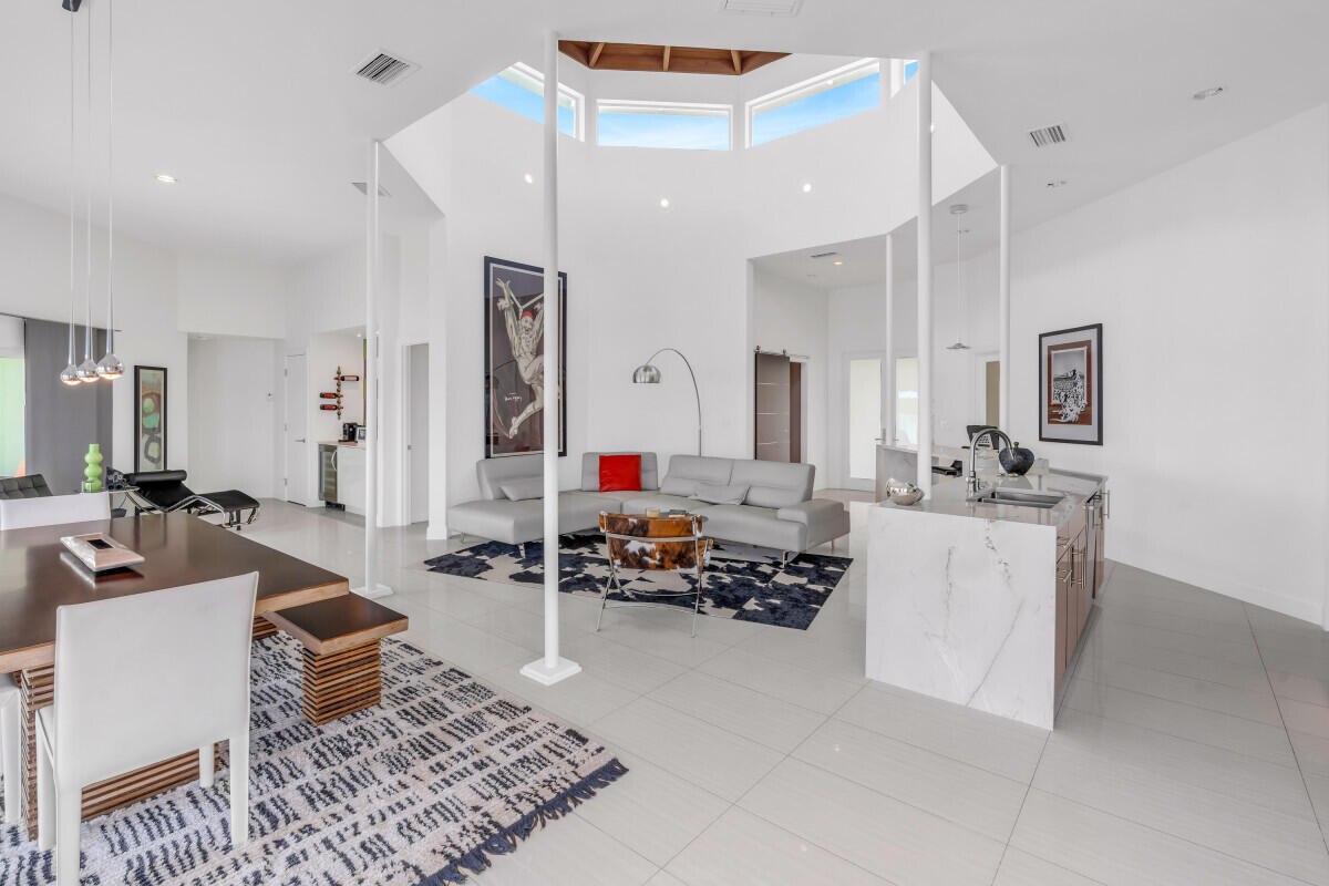 108 Sunset Drive Marathon, FL 33050 - Photo 9 of 46 a living room with furniture and a wooden floor