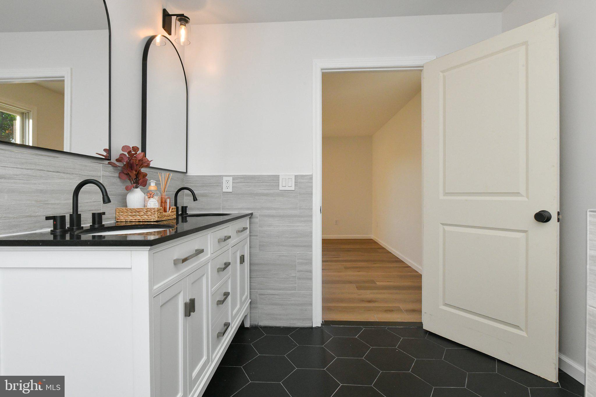 271 Friendship Road Cranbury, NJ 08512 - Photo 18 of 25 Sleek modern bathroom with stylish accents.