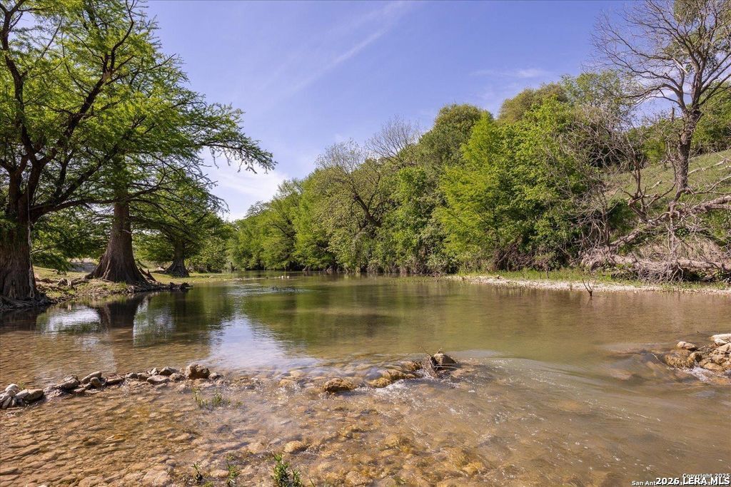 318 River Ridge Boerne, TX 78006 - Photo 41 of 46 a view of a lake with houses in the background