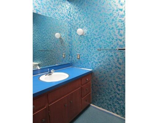 9 Stonehedge Road Lincoln, MA 01773 - Photo 11 of 14 a bathroom with a sink and a mirror