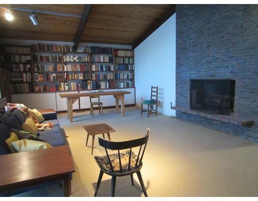 9 Stonehedge Road Lincoln, MA 01773 - Photo 3 of 14 a dining room with a table and chairs