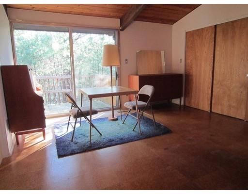 9 Stonehedge Road Lincoln, MA 01773 - Photo 8 of 14 a living room with furniture rug and a window