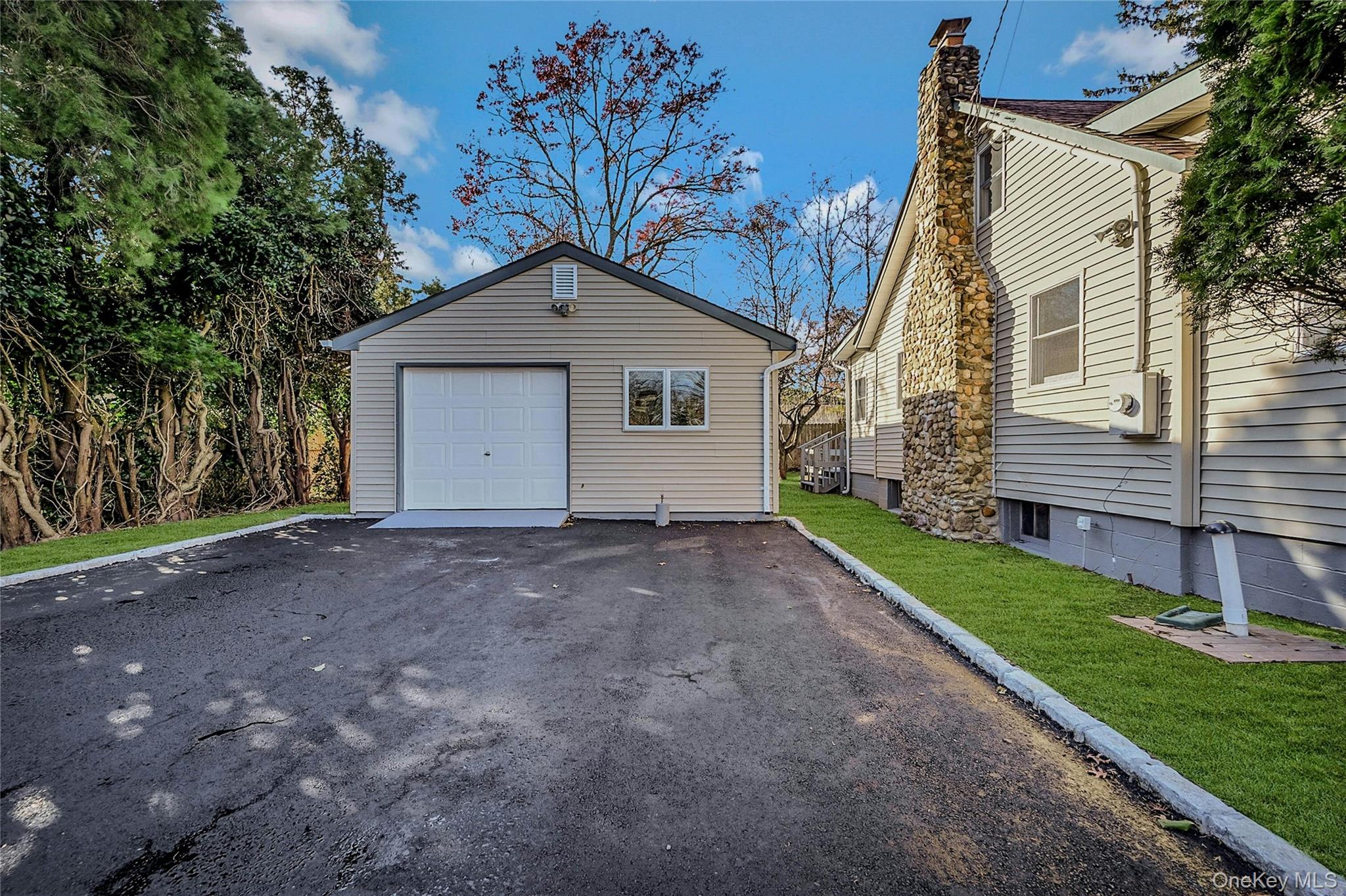 8 Pansy Road Rocky Point, NY 11778 - Photo 23 of 31 Detached Large Two Car Garage Great For An Art Studio, Hobby Room, Game Room Or Home Office
