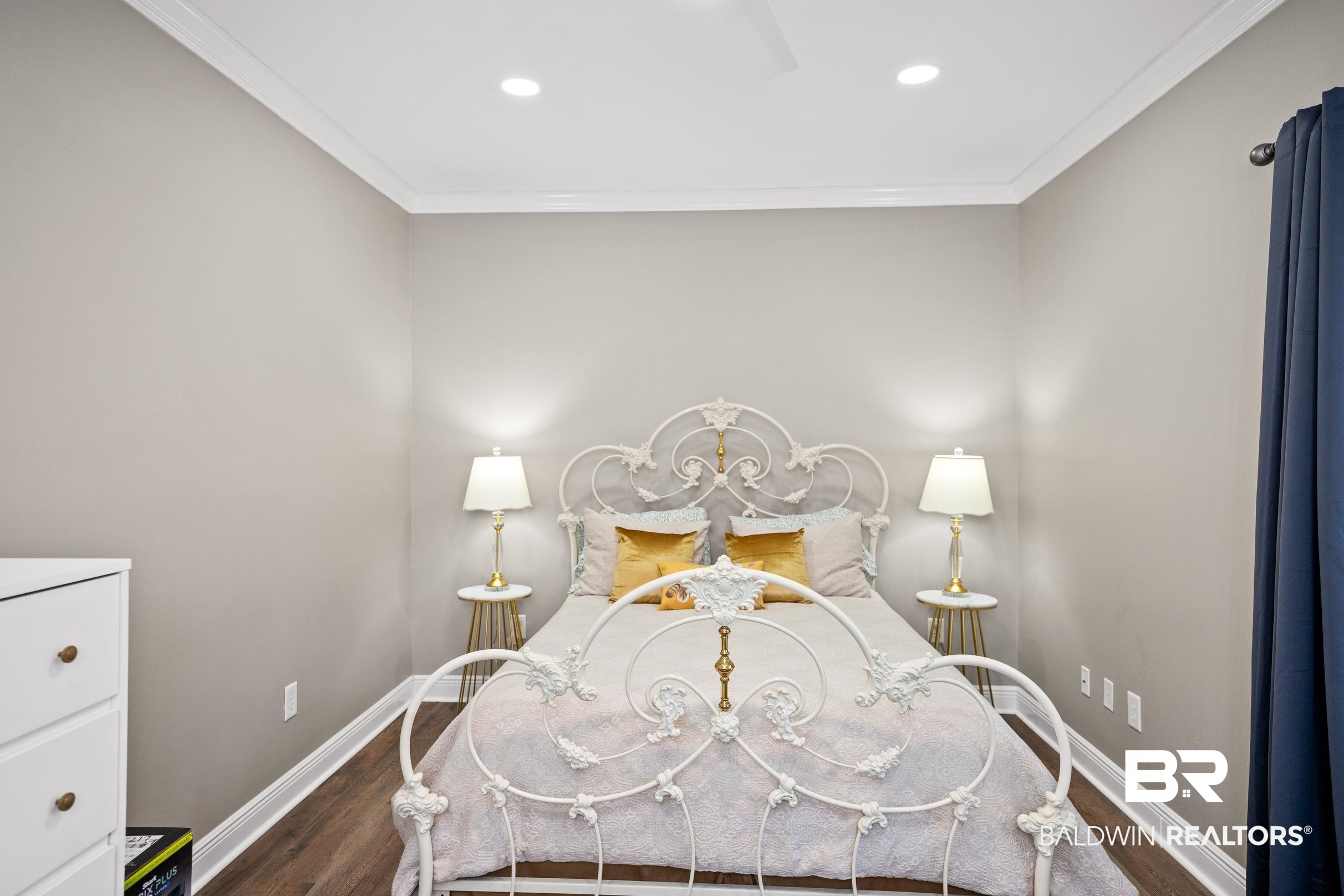5217 Greentree Road Orange Beach, AL 36561 - Photo 46 of 58 Bedroom with dark wood-style floors, recessed lighting, crown molding, and a ceiling fan