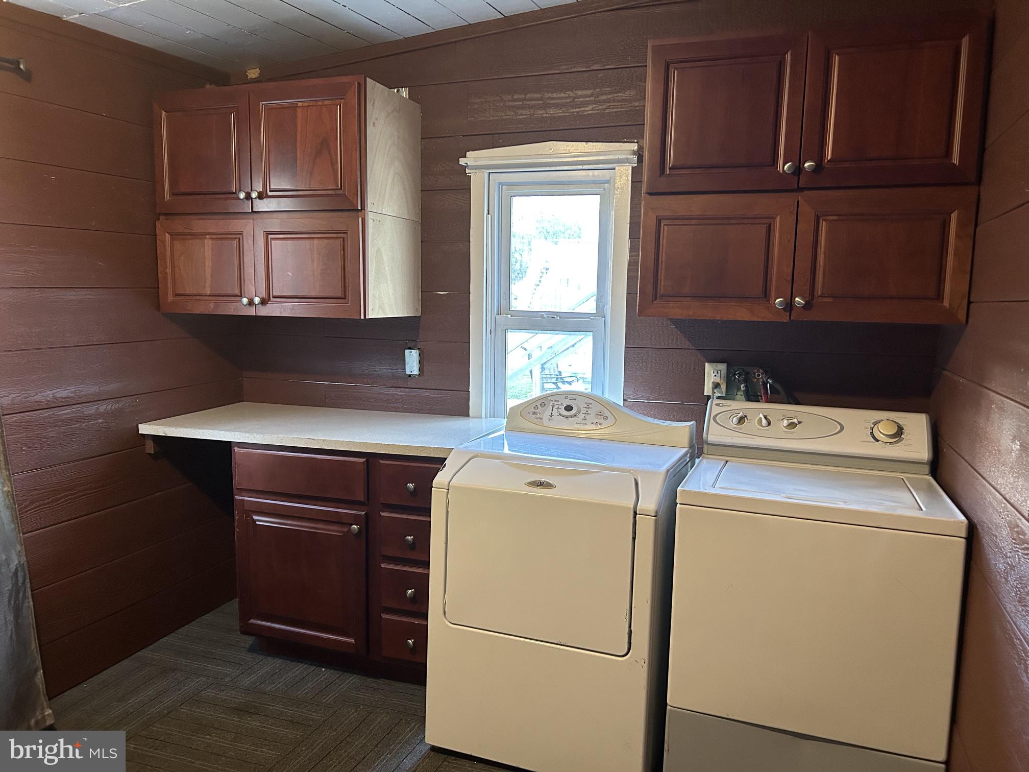 160 South Main Street, Unit B Manheim, PA 17545 - Photo 11 of 11 Cozy laundry nook with wooden accents.