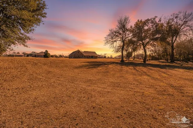 a view of an ocean with a mountain