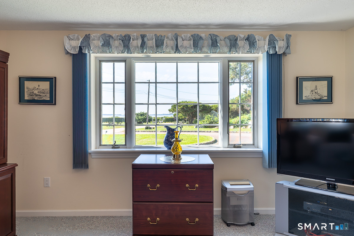 132 Latimer Point Road, Unit 132 Stonington, CT 06378 - Photo 26 of 38 Ideal view point from lower level study, office or entertainment room.
