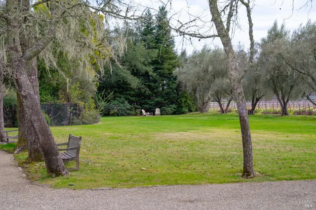 a front view of a house with sitting space and garden
