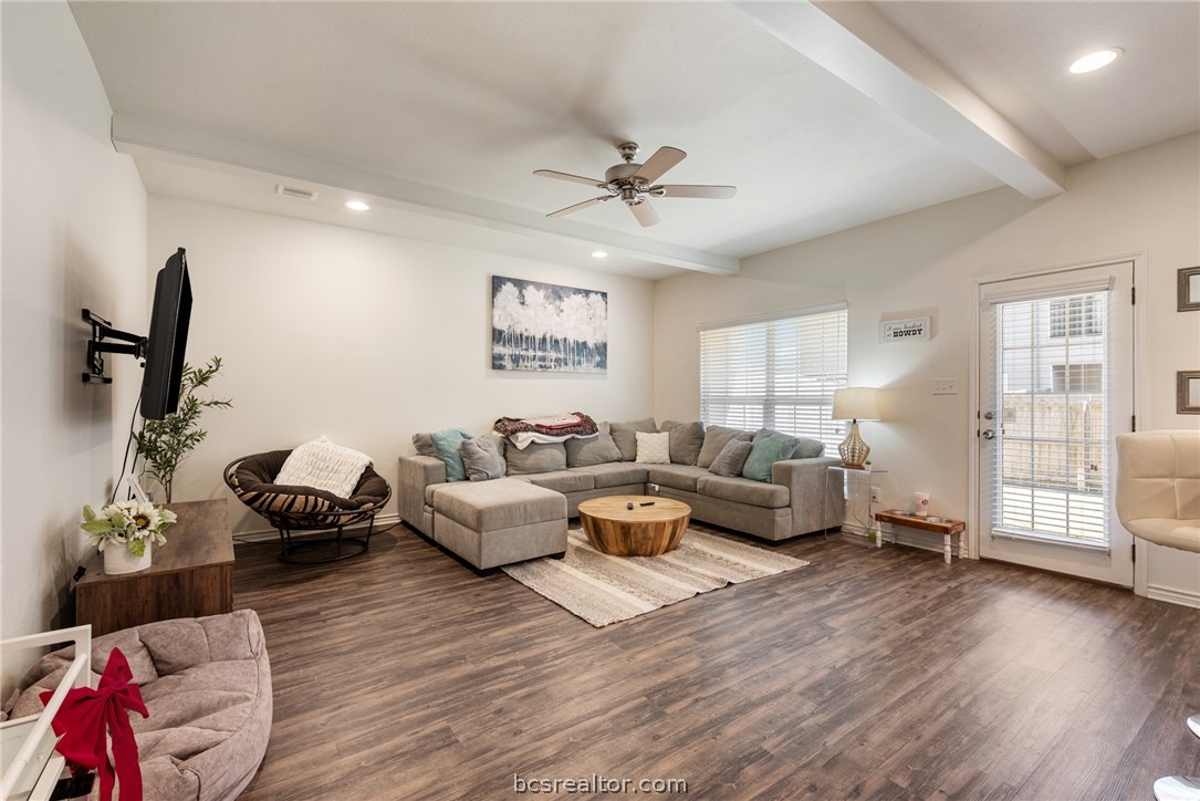 403 Kate Lane College Station, TX 77845 - Photo 7 of 23 a living room with furniture or wooden floor and a ceiling fan