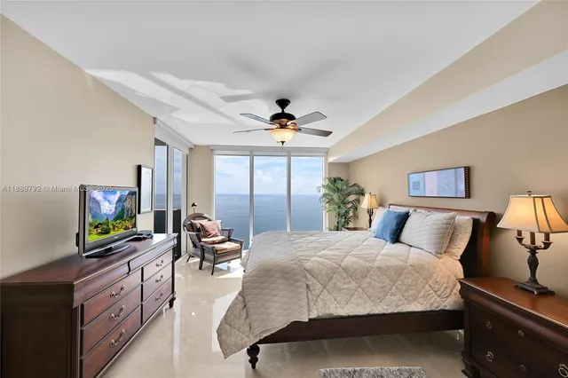 a bedroom with a bed furniture and a window