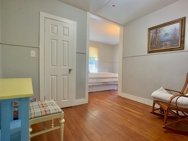 10 Maple Avenue Danvers, MA 01923 - Photo 12 of 41 a room with furniture and wooden floor