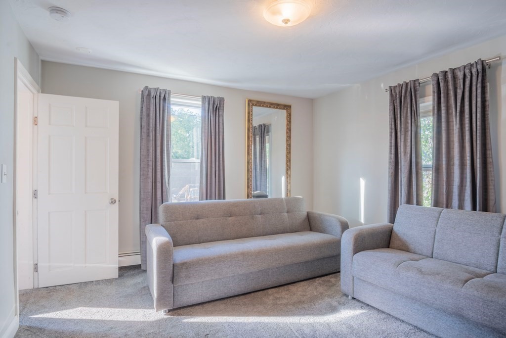 10 Maple Avenue Danvers, MA 01923 - Photo 18 of 41 a living room with furniture and a window