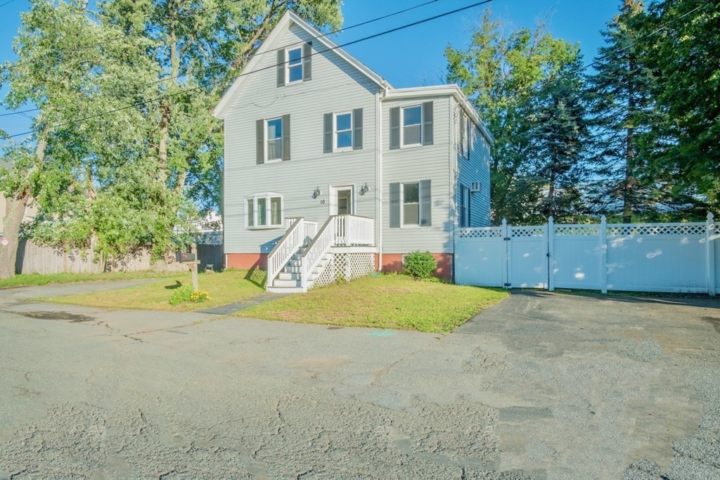 10 Maple Avenue Danvers, MA 01923 - Photo 2 of 41 a view of a house with backyard and a tree