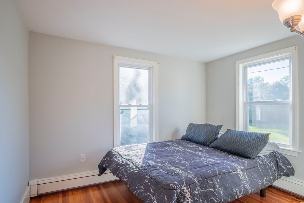 10 Maple Avenue Danvers, MA 01923 - Photo 23 of 41 a bedroom with a bed and a window