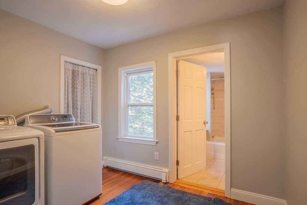 10 Maple Avenue Danvers, MA 01923 - Photo 24 of 41 a view of a room with dryer and washer