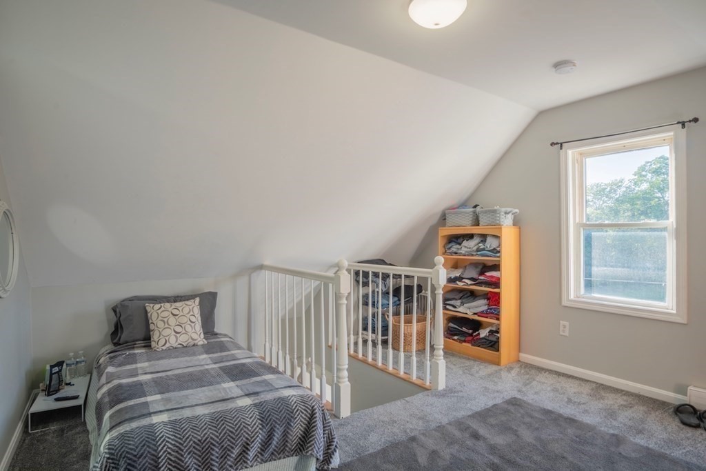 10 Maple Avenue Danvers, MA 01923 - Photo 30 of 41 a bedroom with a bed and a window