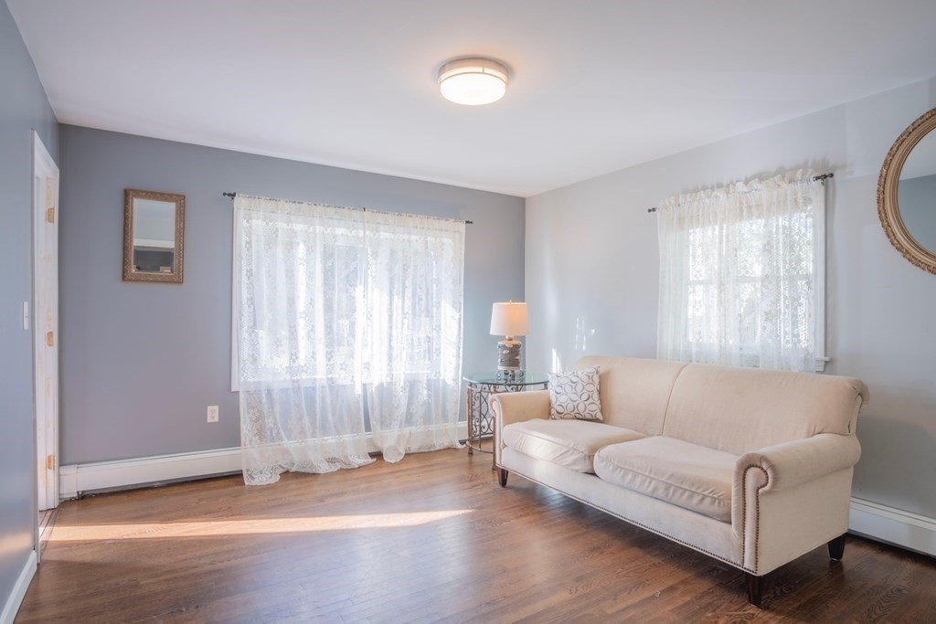 10 Maple Avenue Danvers, MA 01923 - Photo 3 of 41 a living room with furniture and a window