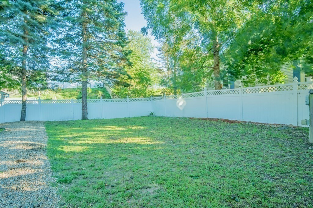 10 Maple Avenue Danvers, MA 01923 - Photo 38 of 41 a backyard of a house with lots of green space