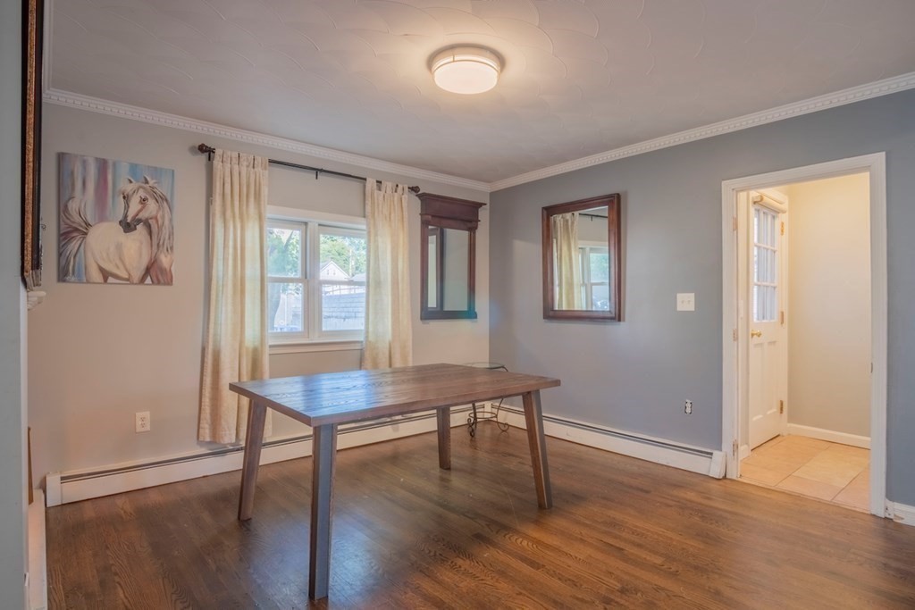 10 Maple Avenue Danvers, MA 01923 - Photo 7 of 41 a view of a workspace with furniture window and wooden floor