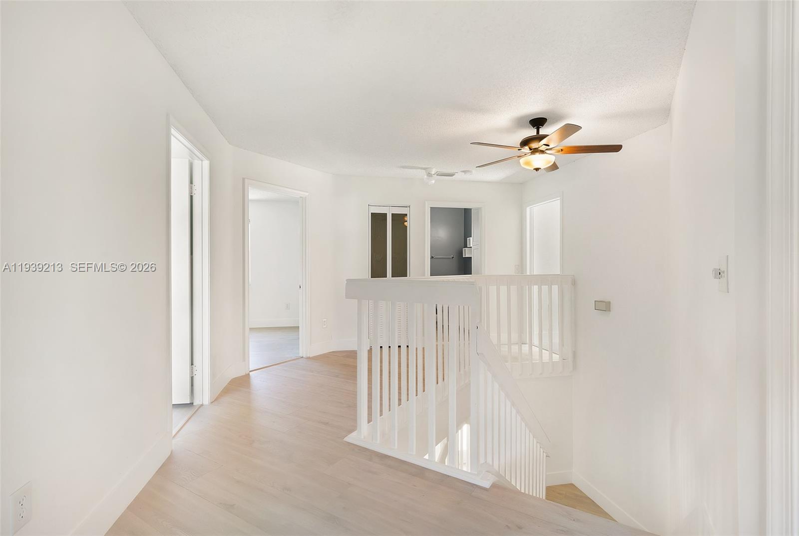 22300 Sands Point Drive Boca Raton, FL 33433 - Photo 14 of 17 a view of a livingroom with a staircase
