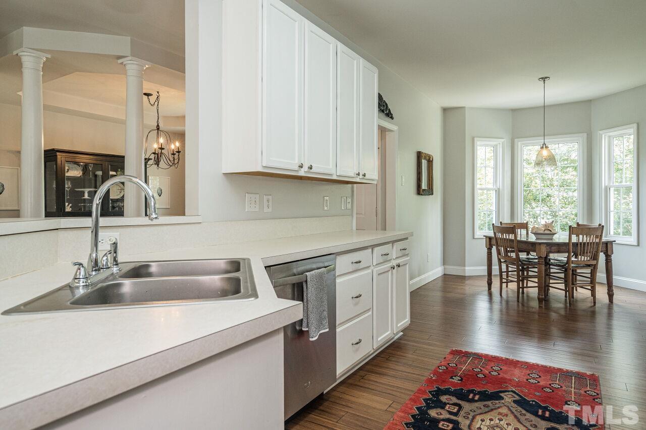 3008 Agent Court Raleigh, NC 27603 - Photo 10 of 28 One more view of the kitchen showing extensive cabinets and a lot of counter space!