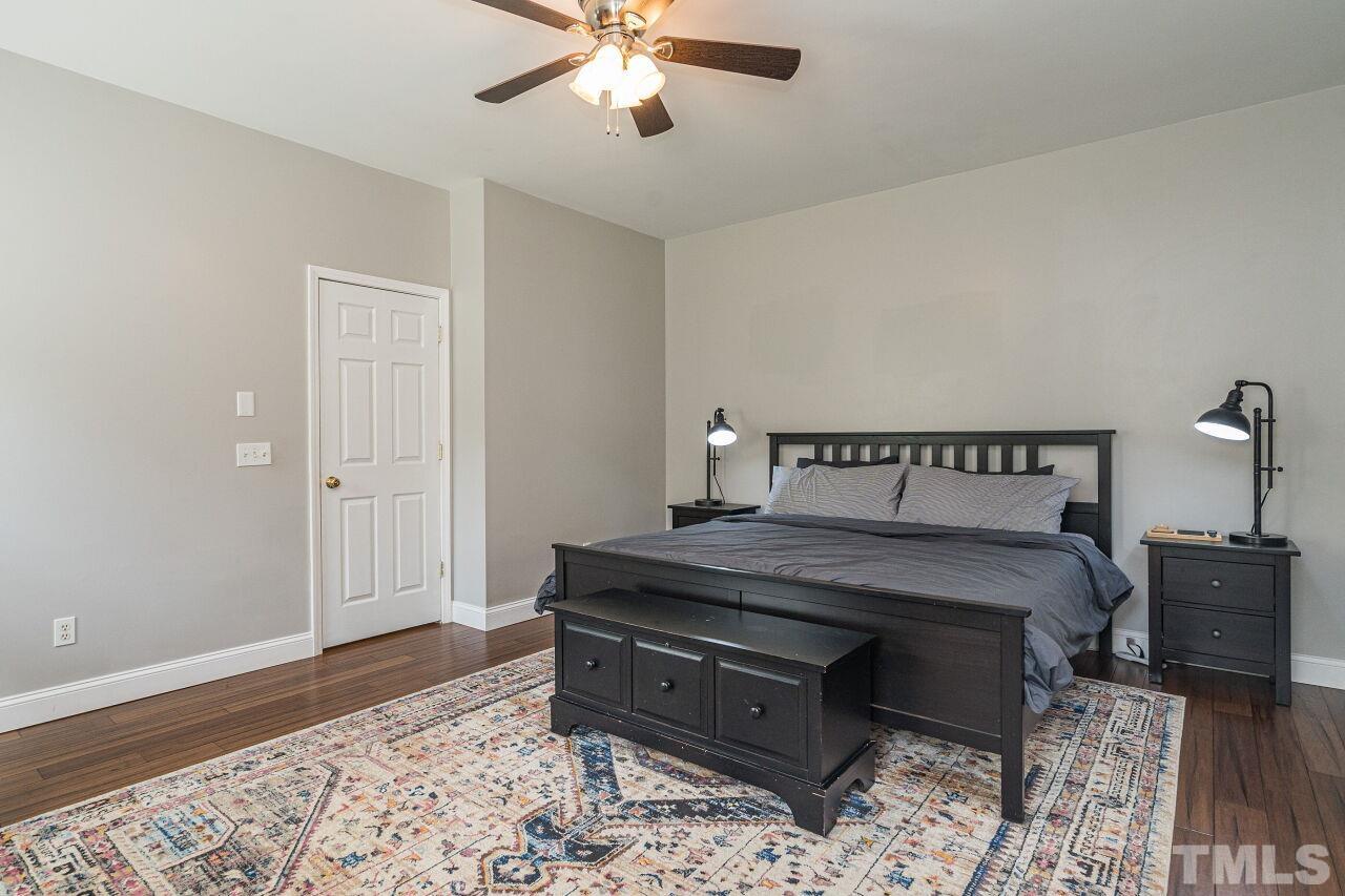 3008 Agent Court Raleigh, NC 27603 - Photo 13 of 28 Another view of the spacious bedroom! Flooring updated with engineered bamboo in 2020.