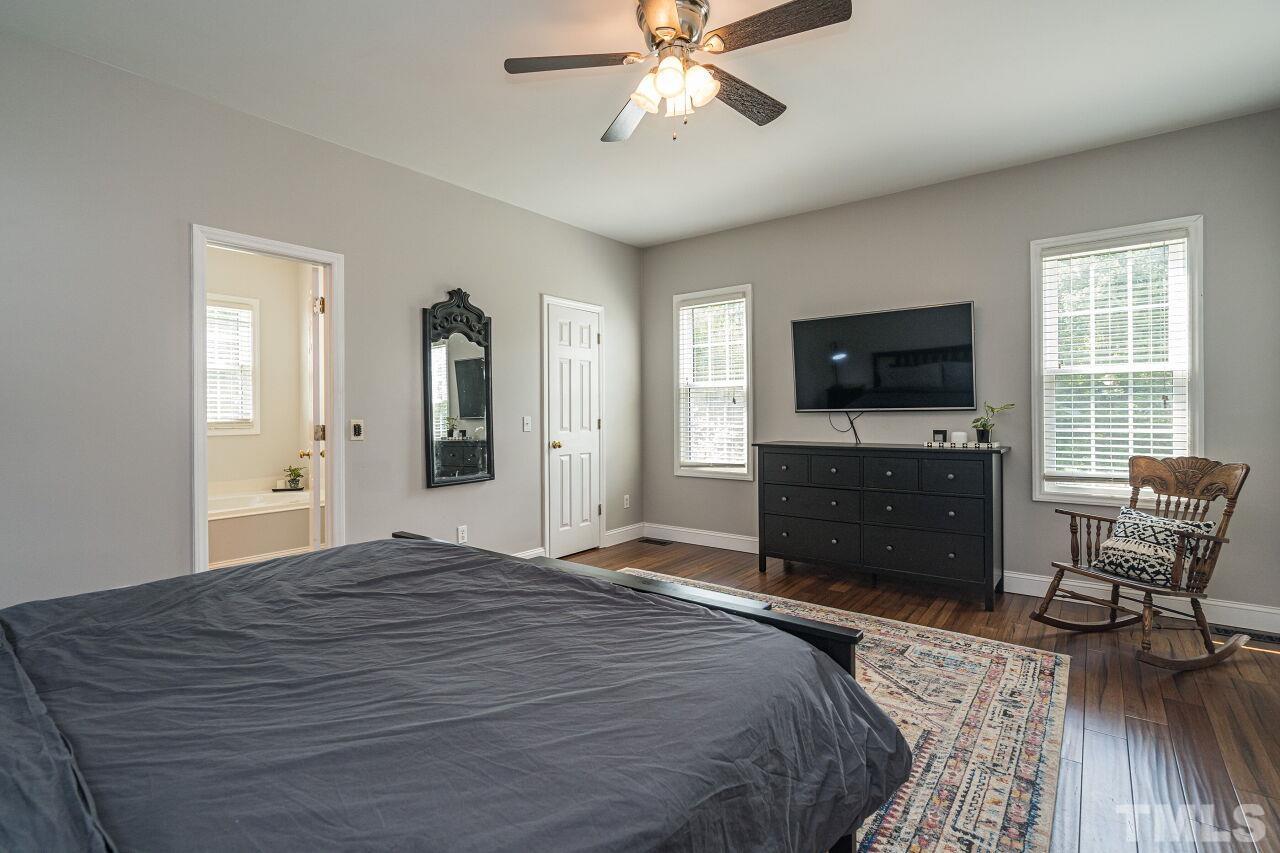 3008 Agent Court Raleigh, NC 27603 - Photo 14 of 28 Another view with a peek of the master bath and then a door to the spacious walk-in-closet!