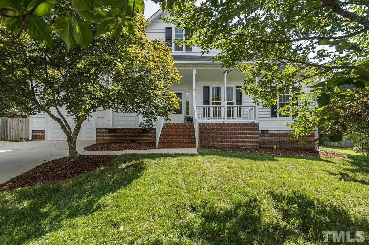3008 Agent Court Raleigh, NC 27603 - Photo 27 of 28 Utilize the one car garage and the parking pad to the left of the house.