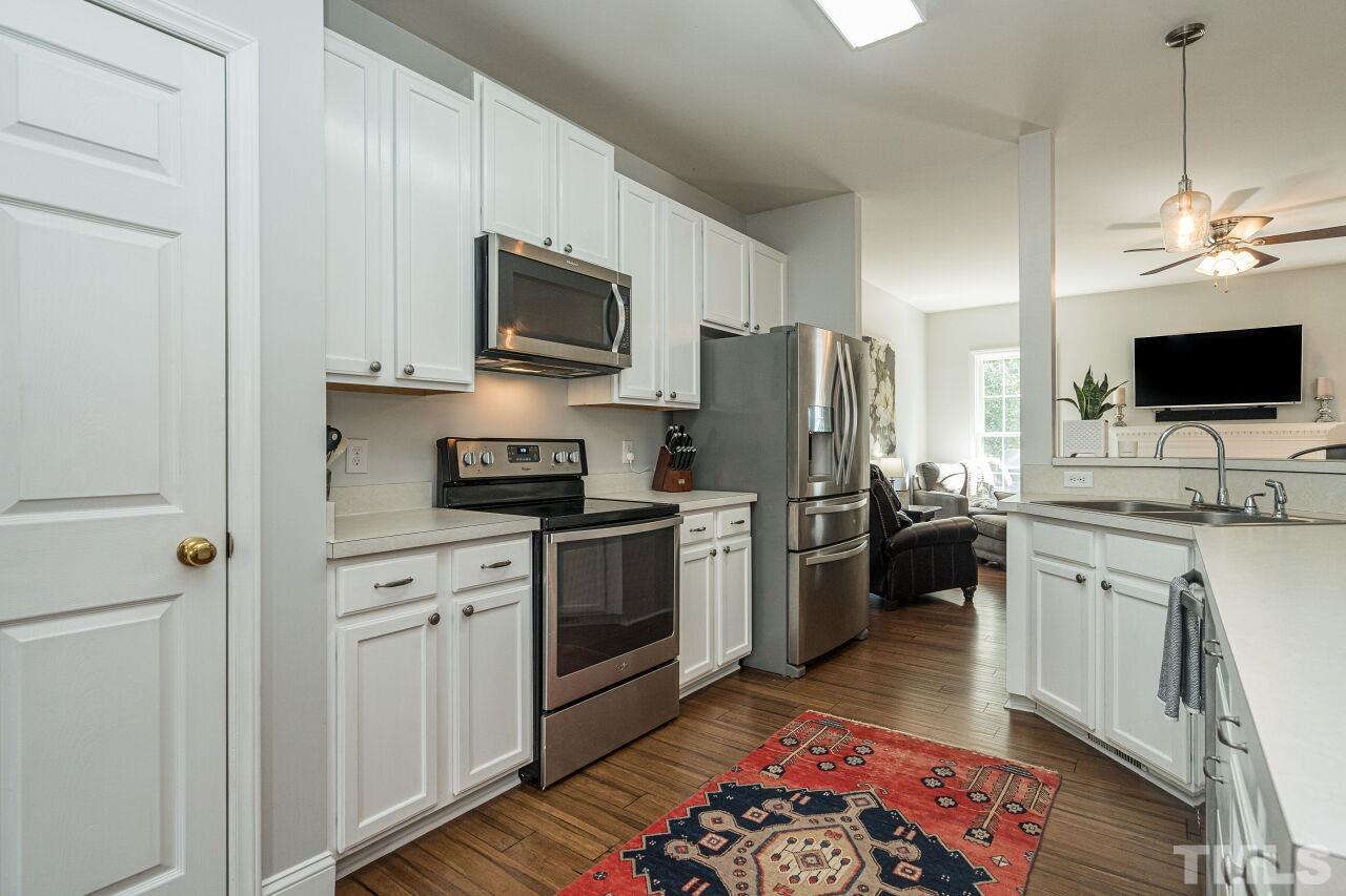 3008 Agent Court Raleigh, NC 27603 - Photo 7 of 28 Wonderful kitchen with stainless steel appliances!