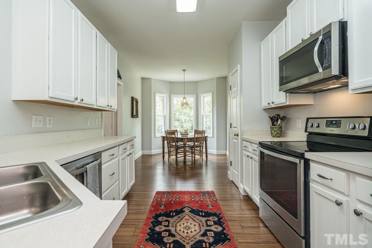 3008 Agent Court Raleigh, NC 27603 - Photo 8 of 28 Love this view of the kitchen and breakfast nook!