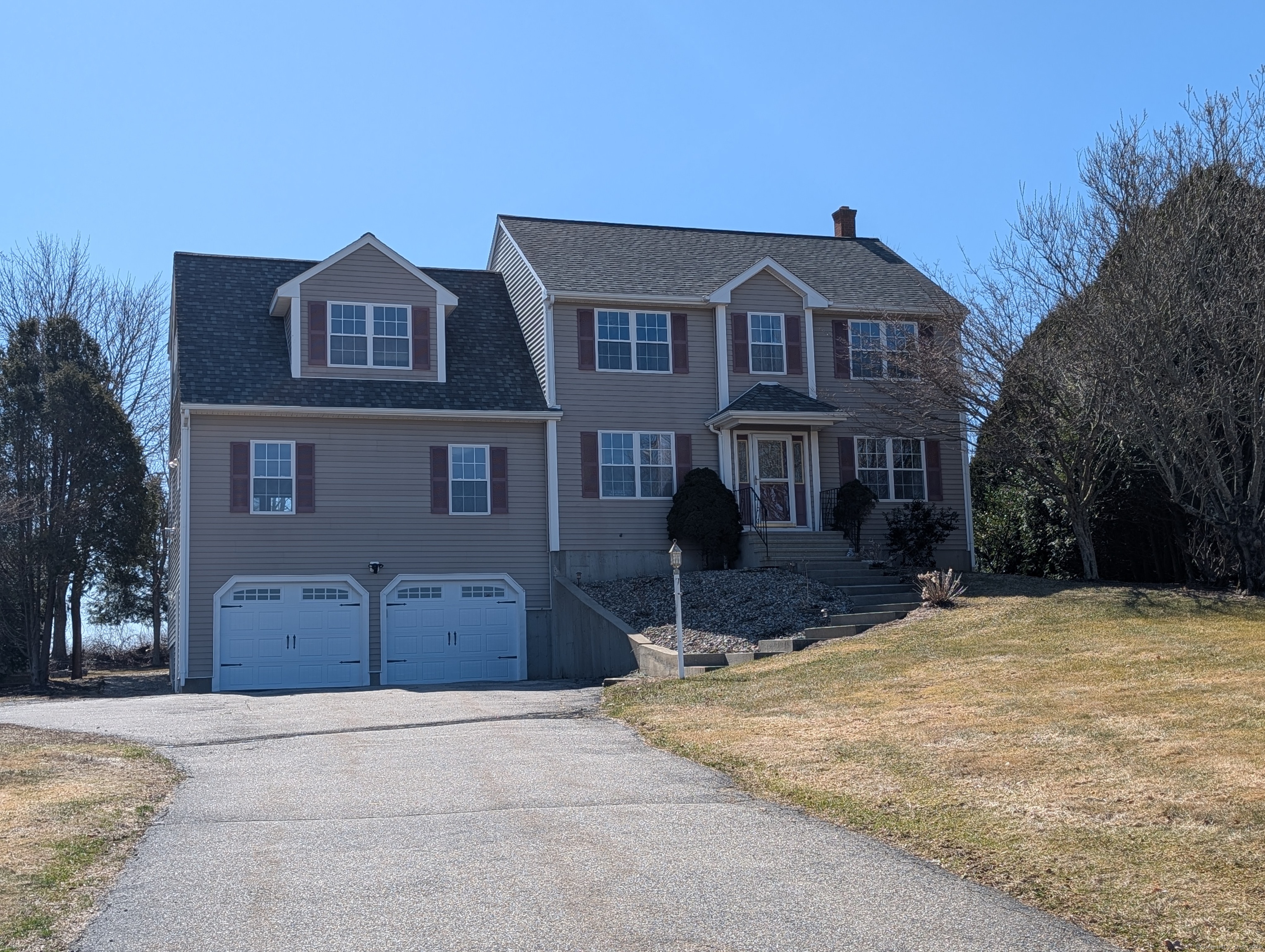 7 Margaret Circle Pomfret, CT 06259 - Photo 1 of 1 a front view of a house with a yard