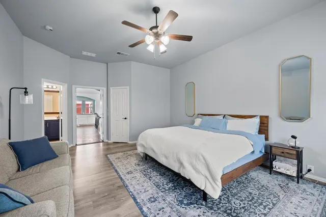 a kitchen with a stove and a white cabinets