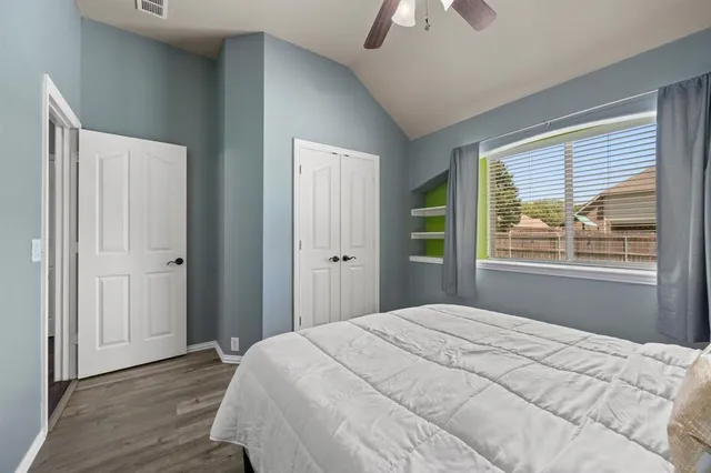 a bathroom with a tub and shower