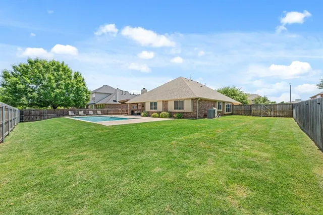 a view of a garden with an outdoor space