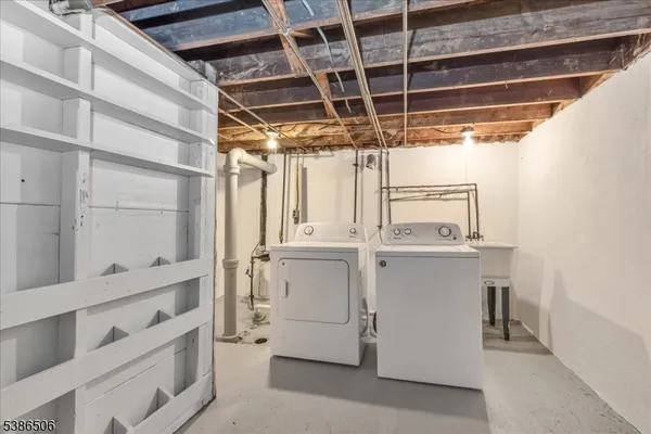 a view of an empty room with racks on the wall