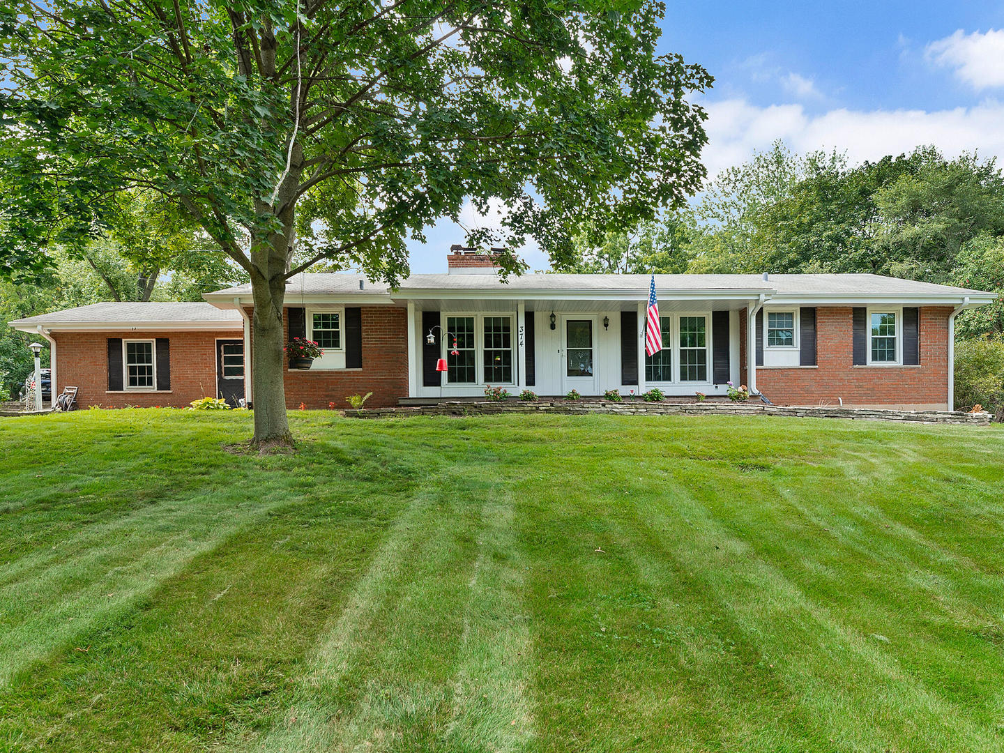 S374 Summit Drive Winfield, IL 60190 - Photo 1 of 17 front view of a house with a yard