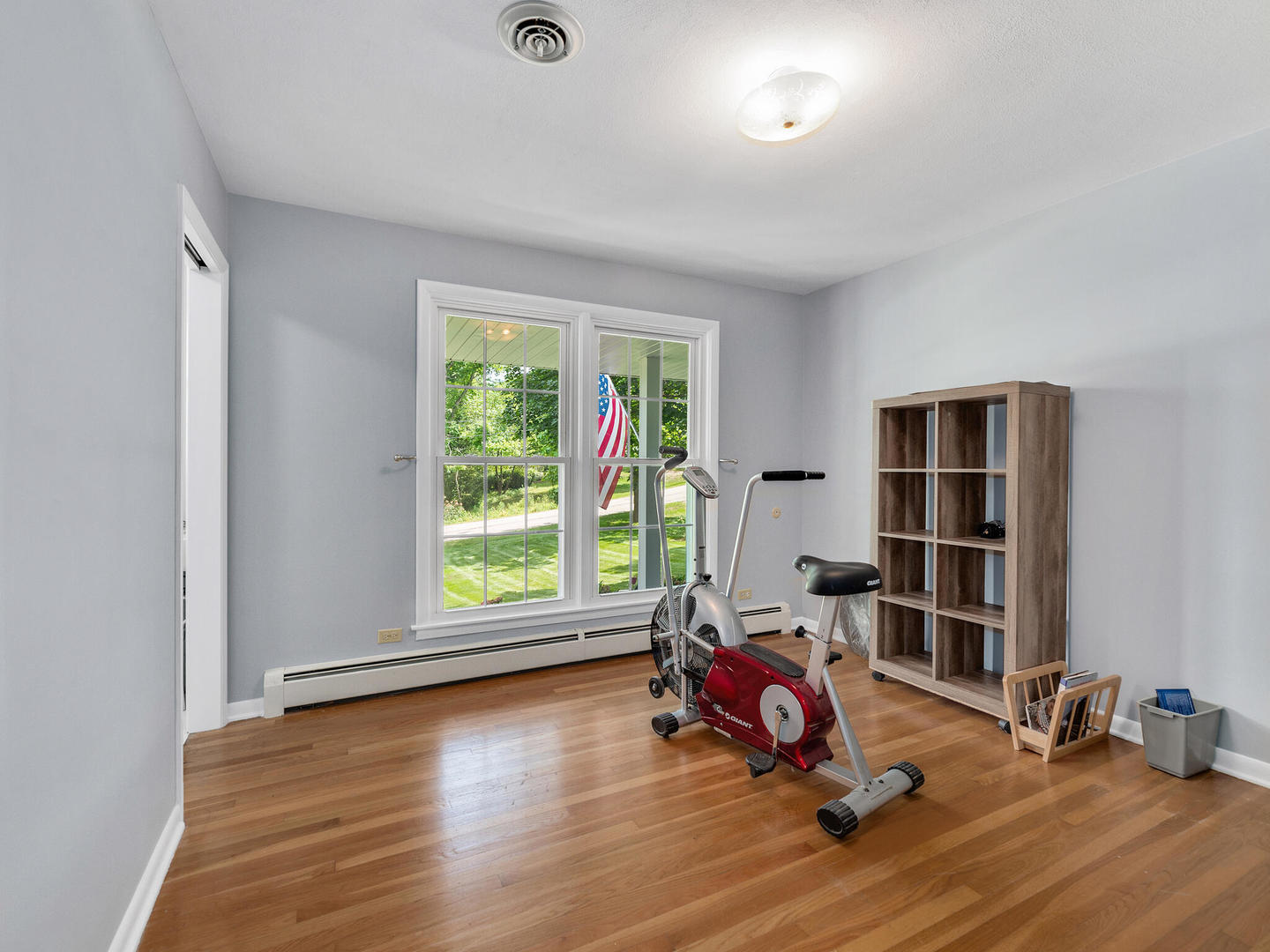 S374 Summit Drive Winfield, IL 60190 - Photo 11 of 17 a living room with furniture and a wooden floor
