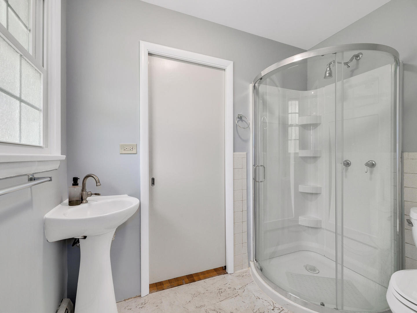S374 Summit Drive Winfield, IL 60190 - Photo 12 of 17 a bathroom with a sink a mirror and a shower