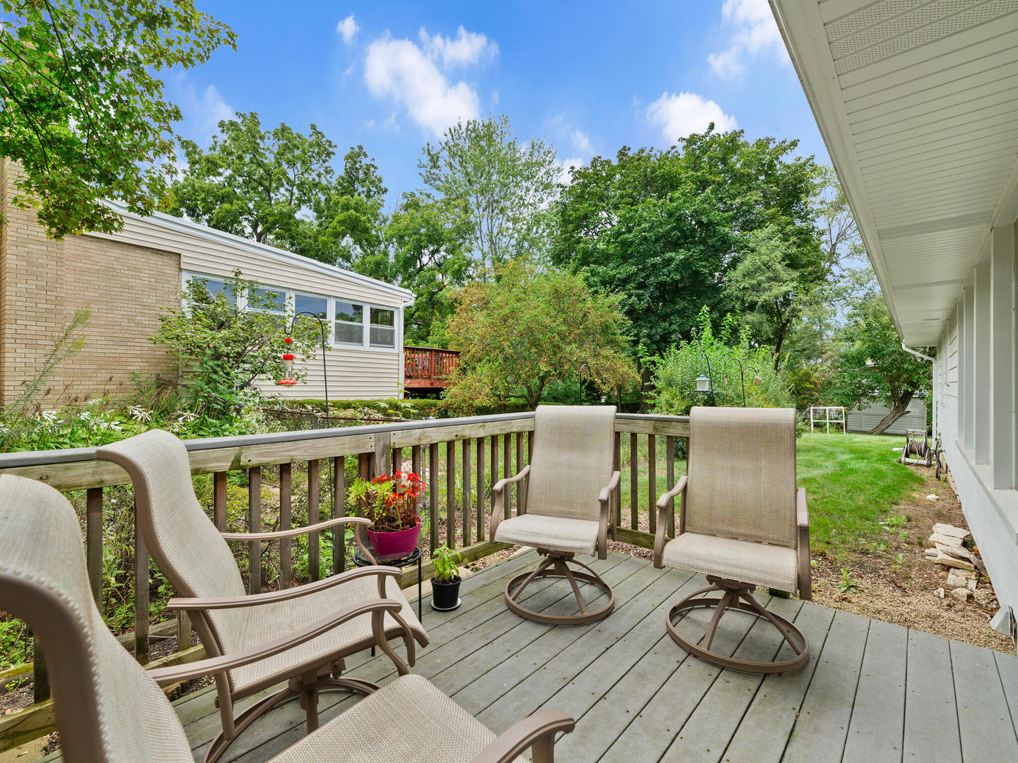 S374 Summit Drive Winfield, IL 60190 - Photo 15 of 17 a view of roof deck with furniture and trees