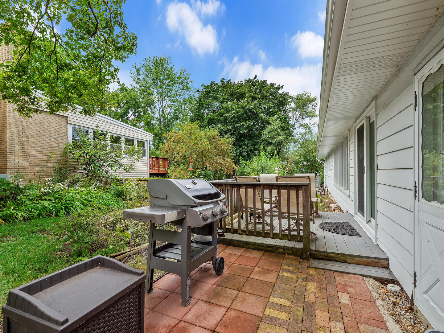 S374 Summit Drive Winfield, IL 60190 - Photo 16 of 17 a view of balcony with wooden floor and outdoor seating