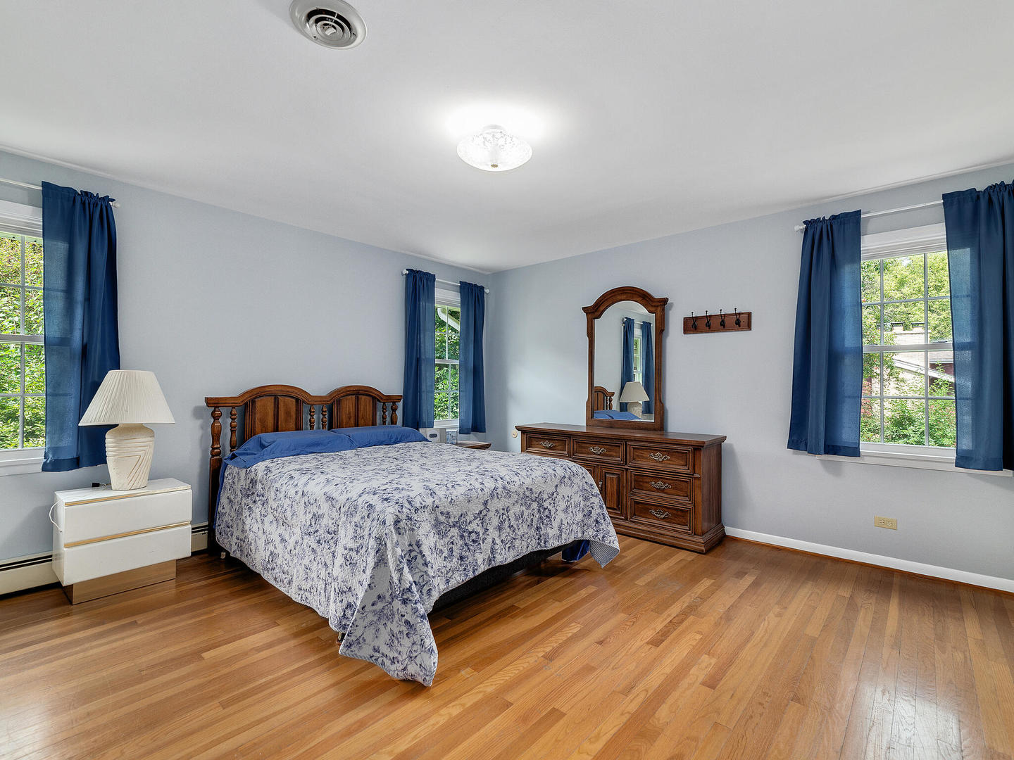 S374 Summit Drive Winfield, IL 60190 - Photo 9 of 17 a bedroom with a bed and wooden floor