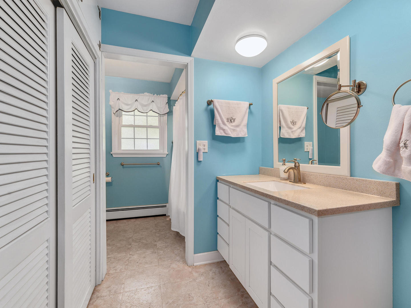 S374 Summit Drive Winfield, IL 60190 - Photo 10 of 17 a bathroom with a sink vanity and a mirror