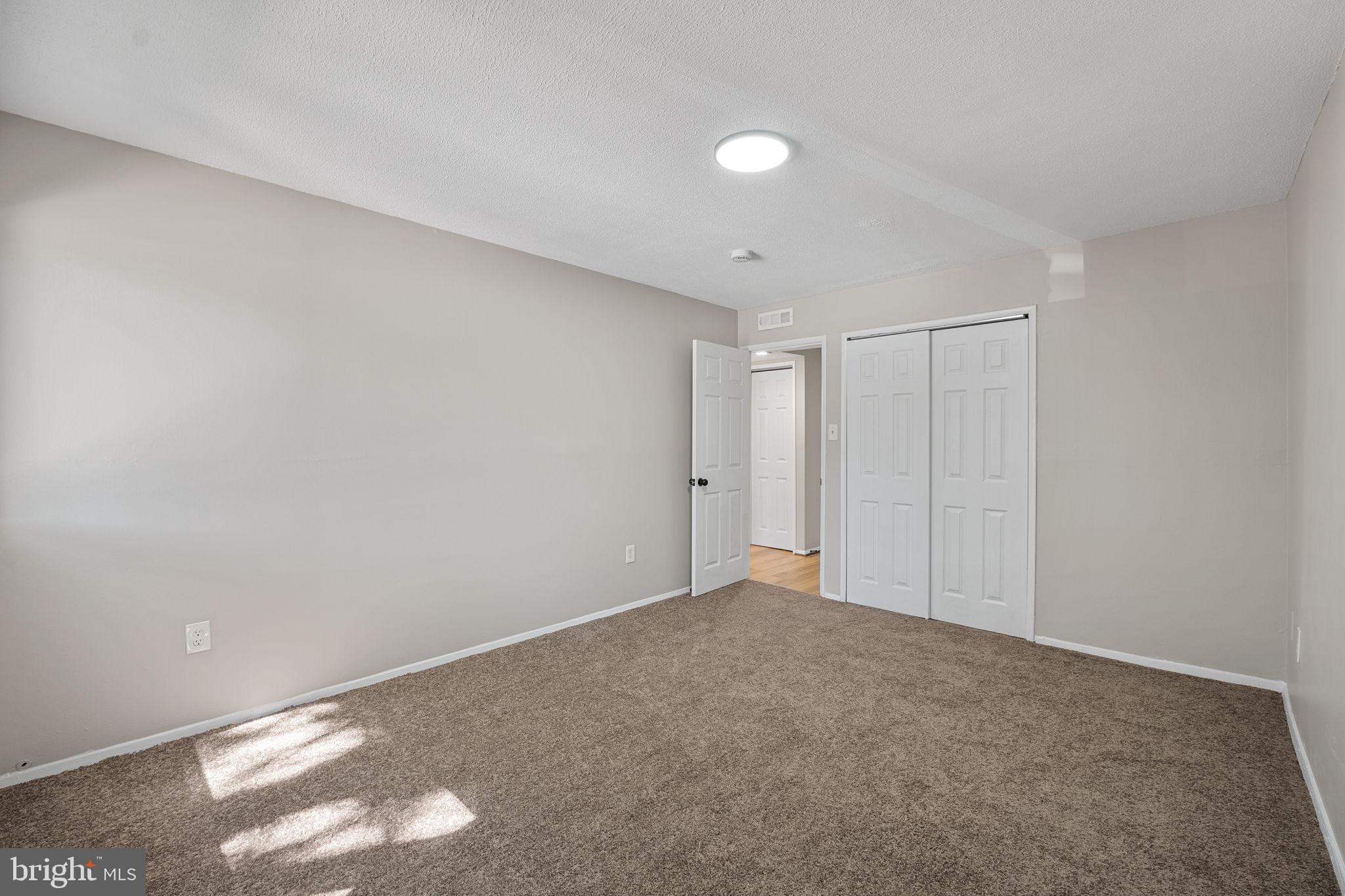 7204 Donnell Place, Unit C5 District Heights, MD 20747 - Photo 5 of 27 a view of an empty room