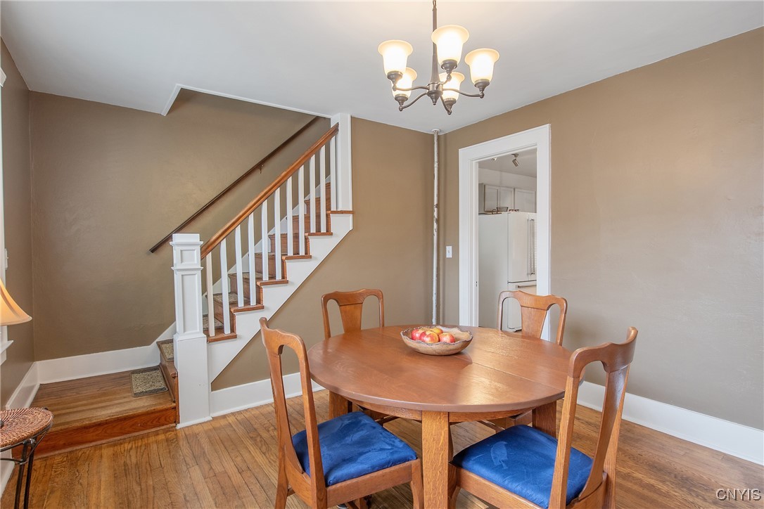 237 Sunstruck Drive Syracuse, NY 13206 - Photo 13 of 39 Formal Dining Room Showcasing The hardwood Floor S